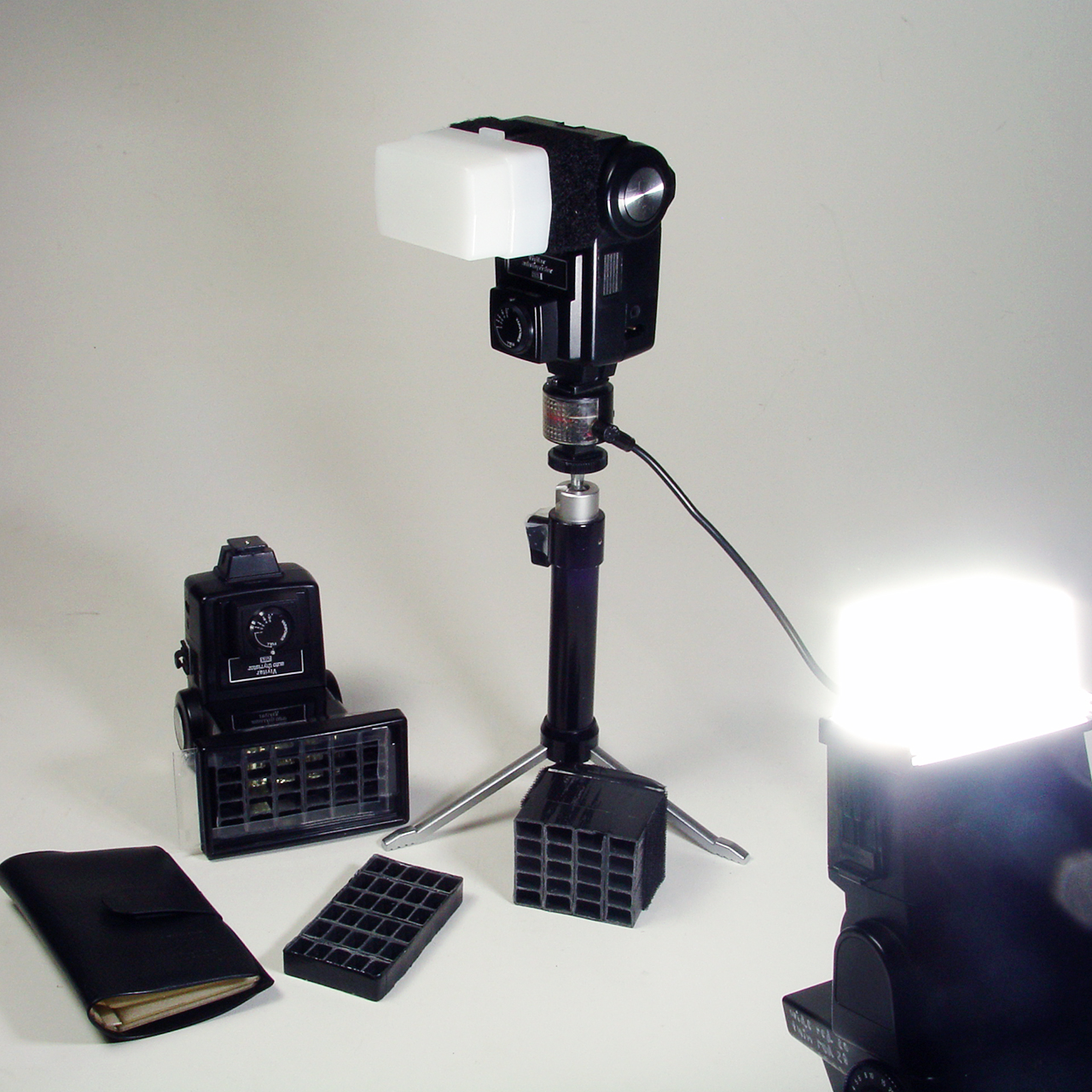 Vivitar 283 with various accessories and Sunpak 522